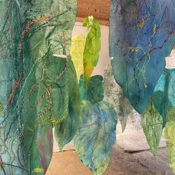 installation "le chant des arbres" - viseline, encaustique, broderies à la main - dimensions variables